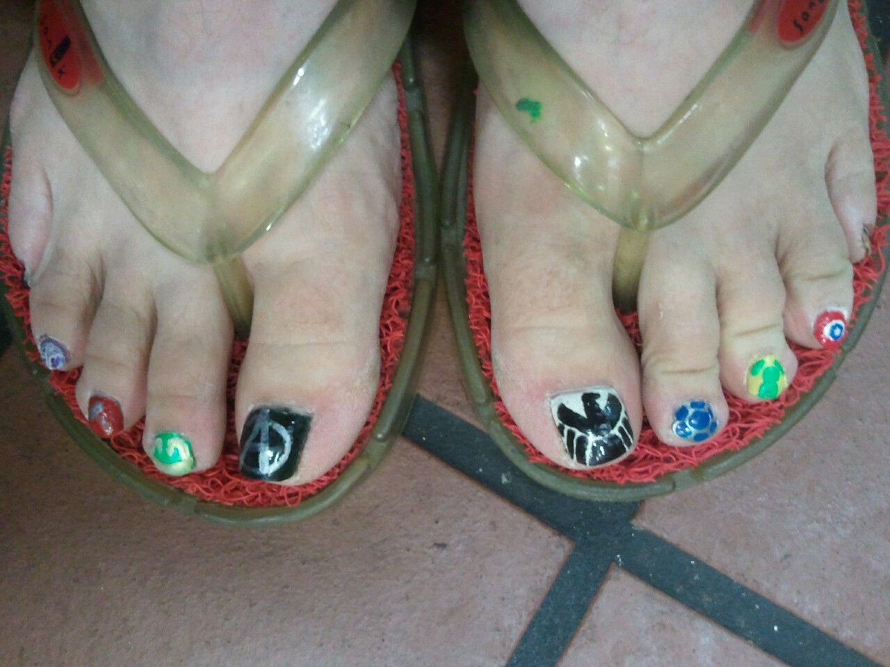 My little toes bend in a weird way! But, here are my Avengers toe nail arts!