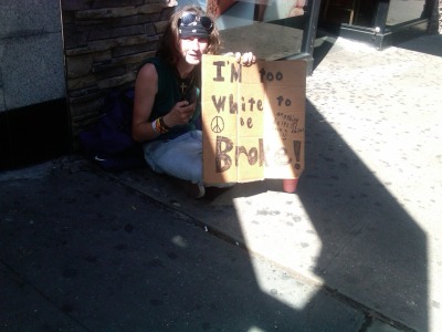 &#8220;I&#8217;m too white to be broke.&#8221; - just seen on 14th street in Manhattan.  (Yes. That is a flip phone in his right hand.)