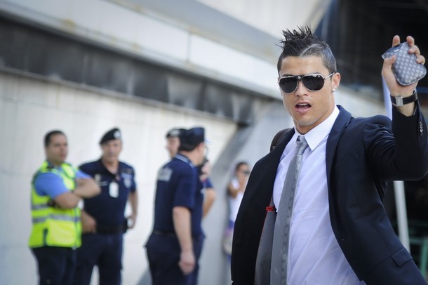 Cristiano waving to the fans at the Lisbon airport just before departing to Poland, 04.06.2012.(via Photo from Getty Images)