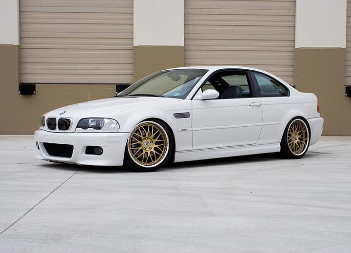 white bmw with gold wheels