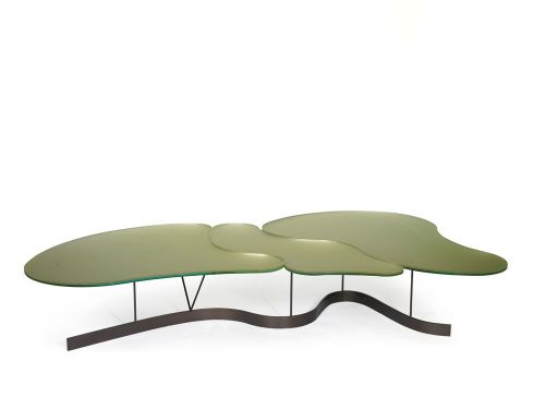 The flowing line of the base of this unique table by Bruno Moinard creates a stunning effect. We love the tone of green of the glass tabletop.
Design Sale -&#8216;Young Collectors&#8217;, Cornette de Saint Cyr, Paris