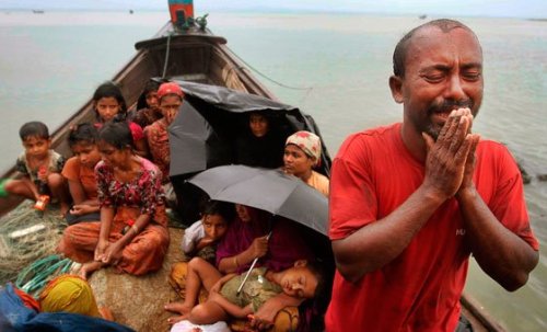 Subhanallah, while we are busy watching Syria, most of us have not 
heard about Myanmar (Burma) until something happened there! (Same like 
Bosnia and Kosovo years ago). There are 2.5 million Muslims in Myanmar. 
Hundreds got killed & thousands of houses burned, all due to 
clashes with the Buddhist majority. In this picture, a Muslim man is 
begging the Bangladesh border guard to let his family in. Please help 
them any way you can and remember them in your Doaa!
