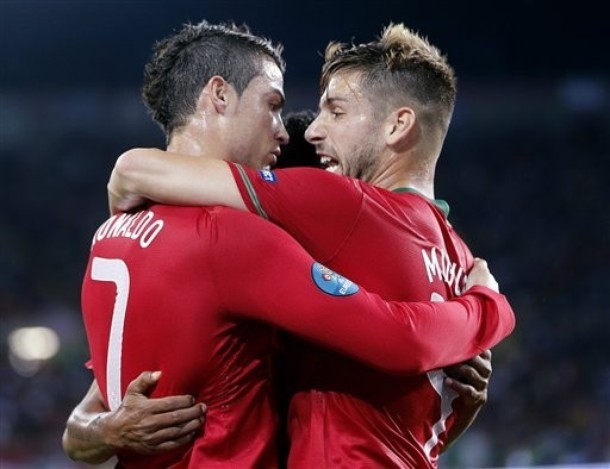How cute.I remember how Miguel Veloso was the one who was by Cristiano&#8217;s side and took his hand when Cristiano was nearly breaking down after missing his big chances in the last game. It was the moment after Varela scored and Cristiano was so emotionally shaken that he couldn&#8217;t even celebrate. Which was interpreted by the media as &#8220;arrogant Ronaldo not even celebrates his team-mate&#8217;s goal&#8221;.
EURO 2012 - Portugal vs. Netherlands 2:1, 17.06.2012(via Photo from AP Photo)