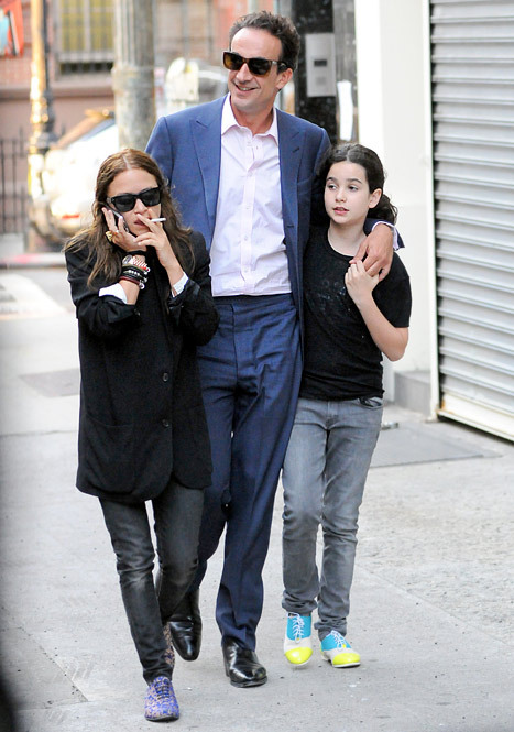 I’m still trying to convince myself that this is just a picture of Mary-Kate Olsen dressed as a smoking hobo, Photoshopped over another picture of a lovely father-daughter outing. 
It’s not. This is Olivier Sarkozy out for a walk with his girlfriend and his daughter.
Suddenly my life doesn’t seem so bad.