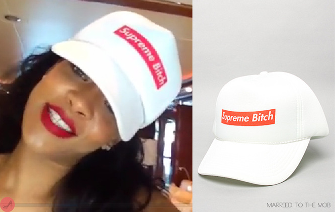 Rihanna wishing One direction&#8217;s Louis girlfriend a happy birthday on Viddy. Spotted wearing &#8216;married to the mob&#8217; the supreme bitch snapback available to purchase from karmaloop.com for $22.00 *(international shipping available)
Rihanna is also wearing a one-piece swimsuit by Oscar De La Renta with her hat.