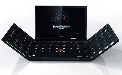 Folding-out Laptop
The Transformers wallpaper on this laptop says it all. This laptop transforms into a mega-laptop as soon as you unfold its keyboard.