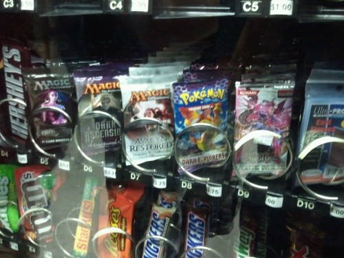 ladyatavan:

Vending machine with dark explorers packs at Bell Book and Comic in Dayton, OH

Very cool - I know MTG packs have been in vending machines in Europe for a while, just glad to start seeing them now in the Colonies.  If this were in my place of work, I would be (A) Broke, and (B) get no work done.