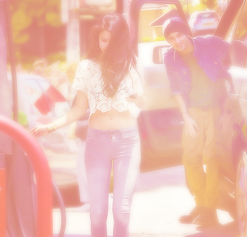 dougiehammonds:

“what are you doing?” the always sleepy dark haired boy inquired from the passenger’s seat. “getting gas.” selena replied effortlessly as she grabbed the keys and hopped out of the car. an amused smile graced his lips as the corners of zayn’s mouth twitched, the smile seemed to be a permanent fixture around the half blooded latina. rolling her eyes selena placed her hand on her hips, her foot tapping against the gravel of the gas station. “are you going to hep me?” she asked. they had never been officially photographed together. a bunch of blurry pictures as they raced for the car outlines of their heads. “there are cameras out there” he replied dumbly, as if the ricocheting flashes off of the rare view and side mirrors weren’t making the fact obvious. ” yeah, i know. and they’re going to catch you being a douche if you don’t get out here and help me. making your hot girlfriend do all of the dirty work.” she mumbled the last part with a teasing smile.
