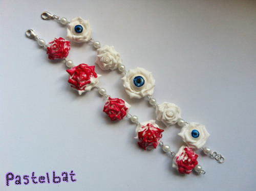 Also made these 2 bracelets one is Alice in wonderland inspired and the other.. i don&#8217;t know just felt like making eye roses XD