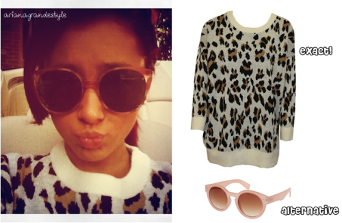 Ariana in a instagram picture a while ago. Exact sweater: MINKPINK.  Alternative sunglasses: Asos. 