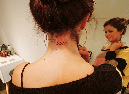 
Selena’s new tattoo that reads ‘76’ in roman numerals for her mom
