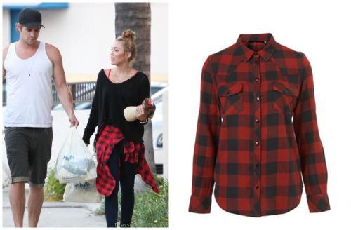Miley Cyrus wears this Topshop Petite Checked Red and Black Shirt.    You can buy it HERE from Topshop for $58