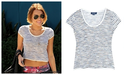 Miley Cyrus wears this Gyrphon Breaker Tee    Unfortunately this is Sold out but you can view the listing HEREYou can buy a similar one HERE from Topshop for $20or HERE for $18 from American Apparel or HERE from Revolve Clothing for $60