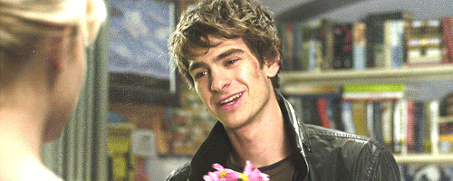rocksursoxoff:shebelievediny0u:cuteys:if a boy ever hid behind the flowers he was trying to give me i would probably just squeeze his face and kiss him because hes so cutewow this is actually all i want in lifeandrew garfield is the cutest