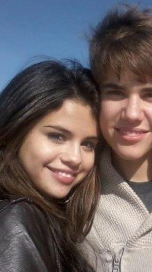 A picture of Selena and Justin from 2011 when they went for a walk on the Santa Monica pier