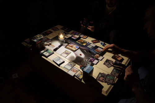 citybug:

Magic by Candlelight - When the Power is Out, There’s Only One Thing To Do: MTG

Totally blows that there’s no power but DANG! - this is just a great way to sling cards.
