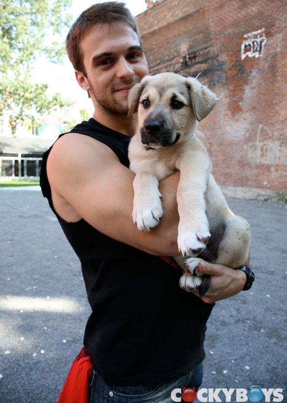Gabriel Clark hanging out with a puppy
