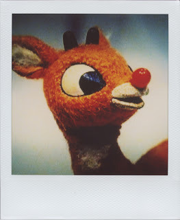 All of the other reindeer used to laugh and call Rudolph names, and the scars from the bullying stuck with him. He was insecure about his appearance even among friends and he avoided being in photos. Then one foggy Christmas Eve, Santa came to say, &#8220;Just get in the picture. I&#8217;ll take a few and you can delete the ones you don&#8217;t like.&#8221;
(Photo cred: http://neatocoolville.blogspot.com)