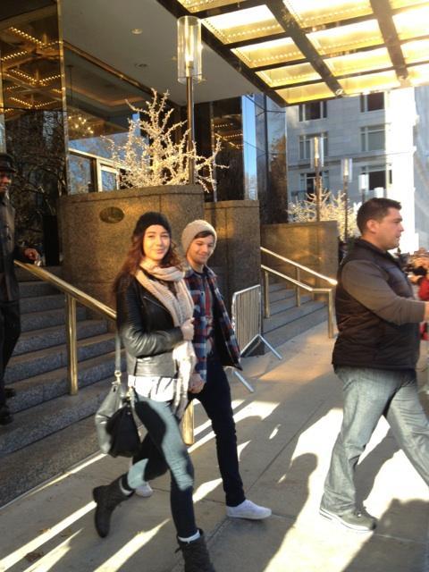 Louis and Eleanor leaving the hotel earlier today.