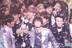 Minho dragged D.O and Chanyeol to the front to bow with them (and show them off)