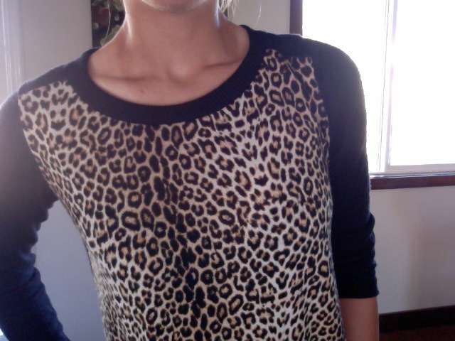  loving my collarbones and my new cheetah top :) 