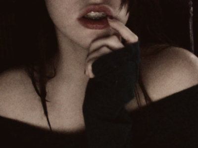 lips, braces, and hand