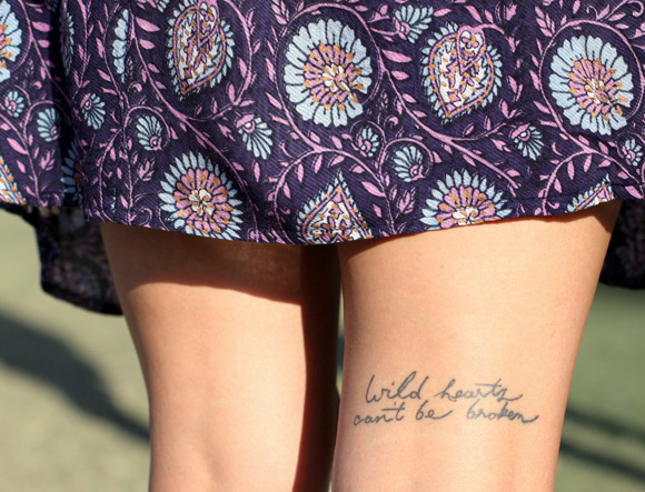 allushed: canyonclub: back of the thigh tattoo photographed by a free people blogger at Coachella. “wild hearts can’t be broken” xx 