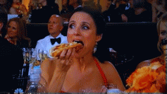 julia louis-dreyfus eating a hotdog at golden globes gif | WiffleGif