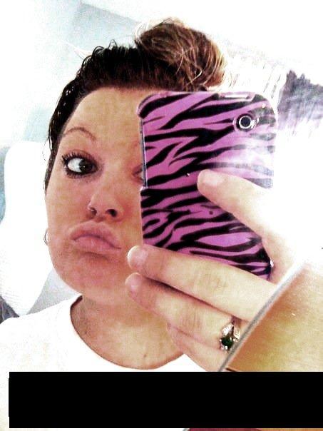 bad tan, animal-print phone skin, crappy phonecam pic taken in dirty bathroom mirror, duckface&#8230; this one&#8217;s got it all, folks.