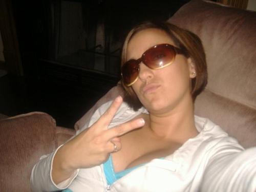 duckface with sunglasses in an easy chair in the dark? oh fuck yeah, that&#8217;s awesome.