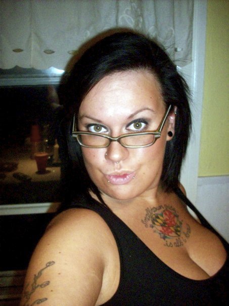 cougar or pre-cougar? it&#8217;s hard to tell from this pic, but she&#8217;s definitely well on her tattooed way to cougar-hood.