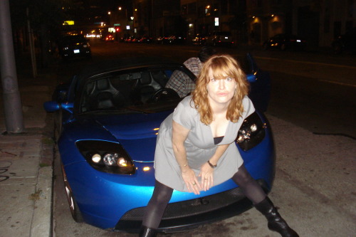 the person who sent us this one says &#8220;Sadly, this is a duckface of my own. Do keep in mind that I am attempting to evoke the Whitesnake &#8220;Here I Go Again&#8221; video while posing in front of my friend&#8217;s cool electric powered Tesla sports car.&#8221; um. okay, if you say so, lady.