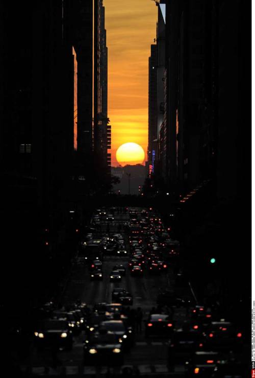abcworldnews: Last night at roughly 8:17pm New Yorkers got a chance to experience “Manhattanhenge”, the semiannual occurrence where the setting sun aligns perfectly with east-west streets.  If you missed it don’t worry though, a second date this year is expected to take place on Monday, July 11 at 8:25 p.m.   Photo Credit: Anthony Behar/Sipa Press via AP Images  