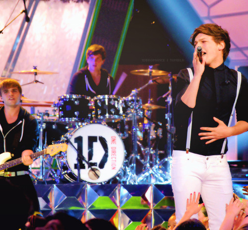 Louis with their drummer, Josh, and bassist, Sandy at the KCA