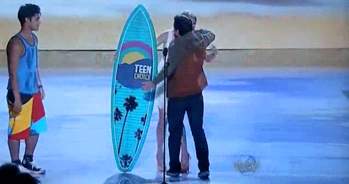  Josh stood up on his tip toes to hug Taylor 