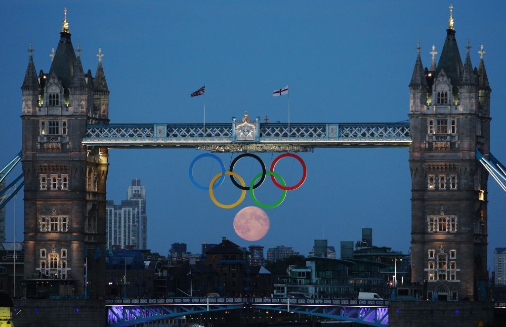 Full Moon Through the Olympic Rings 