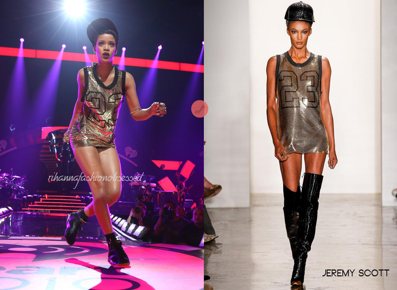 Rihanna performed at iHeart Radio&#8217;s Music Festival wearing a  basketball jersey dress and  faux crocodile snapback cap from Jeremy Scott&#8217;s Spring/Summer 2013 collection. 
Along with her performance look, she is wearing Air Jordan VII black metallic gold retros sneakers; Henry Holland for Le Spec sunglasses; a rectangular ring by Pamela Love; a  serpent ring by Amy Zerner; agold snakehead ring by Emily Miranda and a snack cuff on her arm by Susan Caplan (jewelry credit to Sheena from Haus of Rihanna).