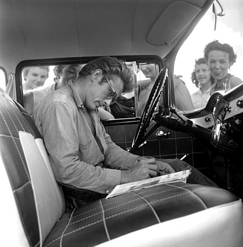 jamesdeandaily: James Dean signs autographs for fans in Marfa, Texas, 1955. 