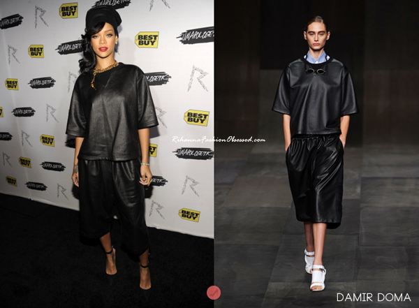 Rihanna greeted her fans at Best Buy in New York to celebrate her album&#8217;s release wearing black leather from head to toe from Damir Domas‘ Spring 2013 collection. Her vintage gun chain necklace is from Chanel by Depuis 1924, with black heels by Manolo Blahnik .