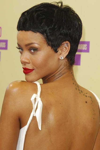 Rihanna&#8217;s Hair Secrets Revealed.
Cutting your hair into a boyish crop is a big decision for most, but not for Rihanna - whose new short style came about very spontaneously indeed.
&#8220;We were on a long flight to Tokyo,&#8221; her hairstylist, Yusef Williams, told us. &#8220;I had all these hair dyes with me, a little blonde and a little ebony black. So we went with the black. Then I remembered we had these clippers and we started shaving off the sides and before we knew it, it was all gone. I didn&#8217;t want to shave it completely though, but she&#8217;s so pretty she could pull it off.&#8221;
Williams began working with the Vogue cover girl nearly four years ago, after - as he describes - &#8220;being sent to her from God&#8221;.
&#8220;We can sit down and talk about hair for hours, she and I,&#8221; he told us during the star&#8217;s 777 tour. &#8220;She sends me pictures of things she&#8217;s seen in magazines at 5am from her home. We take a lot of inspiration from guys actually - Vogue Homme is always good.&#8221;
And what products does Rihanna favour?&#8220;We use a lot of dry shampoo and chlorine-based products. I like to use olive oil products too - they really nourish the hair and give it shine,&#8221; he said.But whilst the star is known for her diverse hair history, Williams assures us there is one style we&#8217;ll never see her try.&#8220;I don&#8217;t see her going for a full afro,&#8221; he said. &#8220;She&#8217;s not that kind of girl.&#8221;