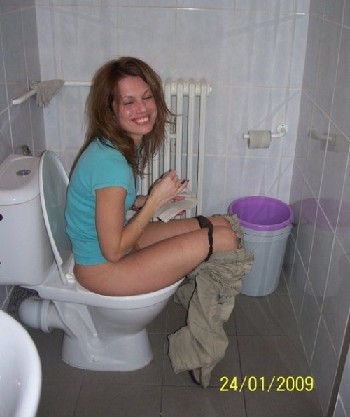 Girl masturbates on the toilet